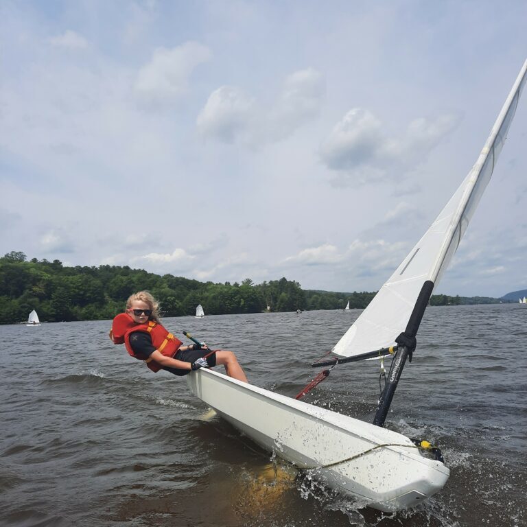 This is a photo of a young child sailing